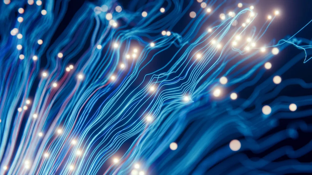Blue fiber optic cables transmitting data
